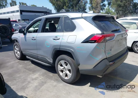 2019 Toyota Rav4 Hybrid Xle from USA, damaged, VIN JTMRWRFVXKD025657
